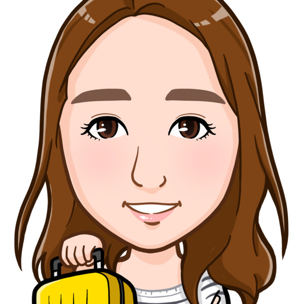 黄色いスーツケースを持った女性の上半身似顔絵